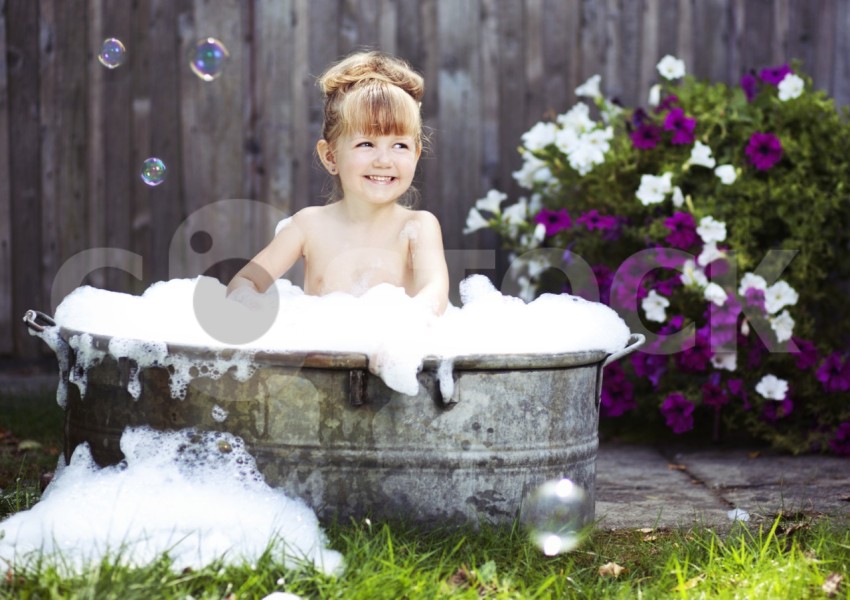 Little girl in a retro bath