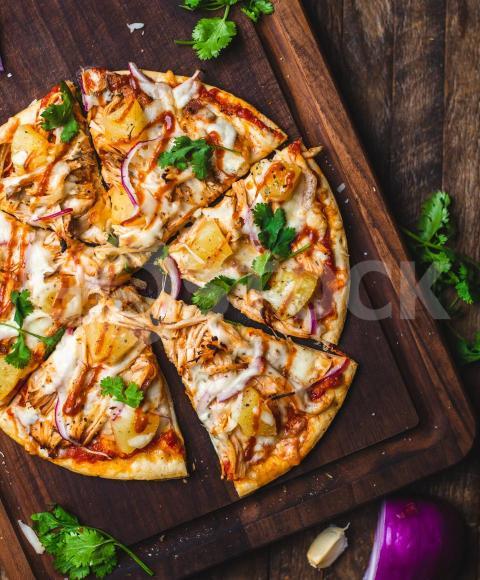 Pizza on wooden table