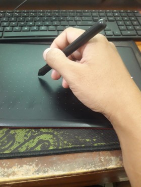 Hand holding display pen